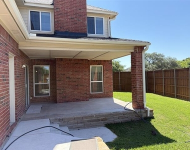1001 Meadow Creek Drive - Photo Thumbnail 2