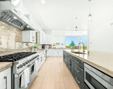 7256 Rue Michael - Photo Thumbnail 39