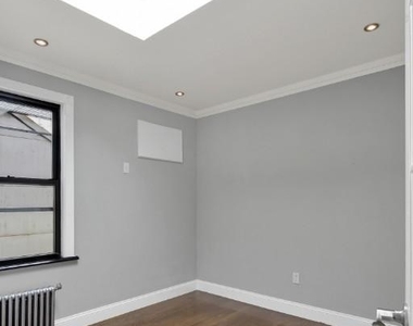 East 26th Street - Photo Thumbnail 7