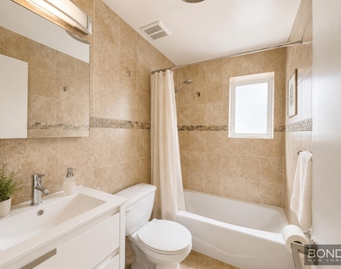 66-11 71st Street - Photo Thumbnail 4
