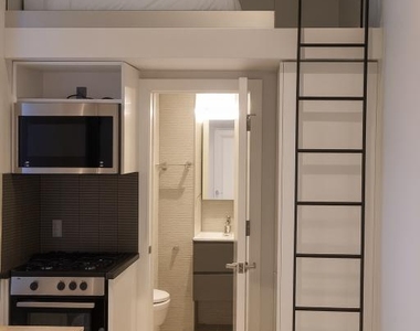 W 51st St - Photo Thumbnail 1