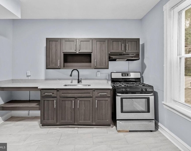 1619 S Conestoga Street - Photo Thumbnail 6