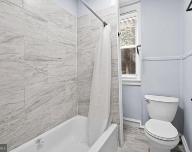 1619 S Conestoga Street - Photo Thumbnail 9