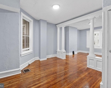 1619 S Conestoga Street - Photo Thumbnail 2