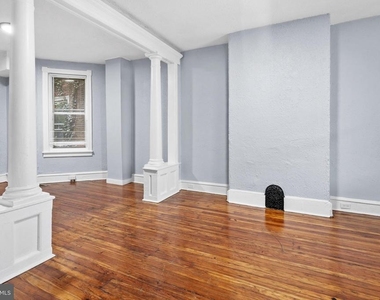 1619 S Conestoga Street - Photo Thumbnail 5