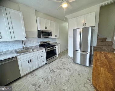 112 E 3rd Street - Photo Thumbnail 14