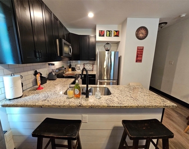 6706 Avenue C - Photo Thumbnail 1
