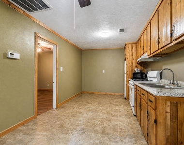 6940 Avenue K - Photo Thumbnail 3