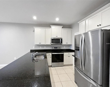 2424 Blowing Breeze Avenue - Photo Thumbnail 10