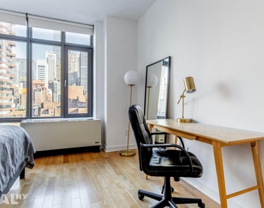 East 34th Street - Photo Thumbnail 3