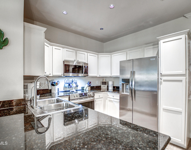 7009 E Acoma Drive - Photo Thumbnail 4