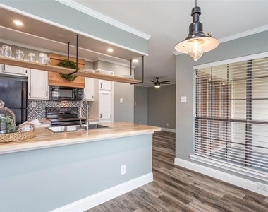 16301 Ledgemont Lane - Photo Thumbnail 6