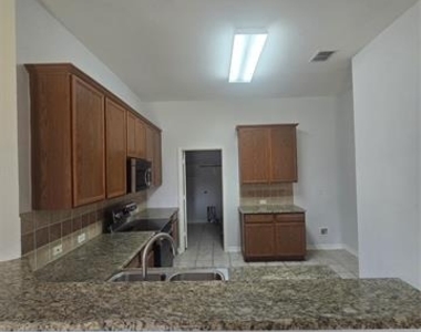 7617 Uvalde Way - Photo Thumbnail 6