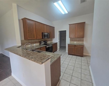 7617 Uvalde Way - Photo Thumbnail 3