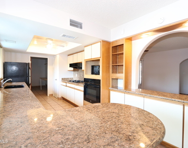 1910 E Manhatton Drive - Photo Thumbnail 3