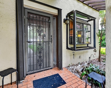 4587 Carambola Circle S - Photo Thumbnail 1