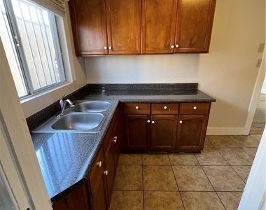 1349 W 49th - Photo Thumbnail 18