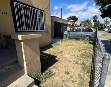 1349 W 49th - Photo Thumbnail 1