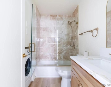 722 E 116th - Photo Thumbnail 3