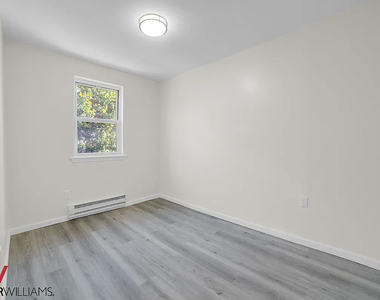 94-27 83rd Street - Photo Thumbnail 4