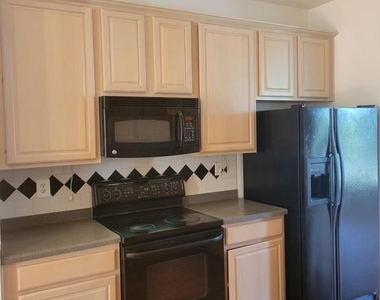 43799 Maison Blanc Square - Photo Thumbnail 5