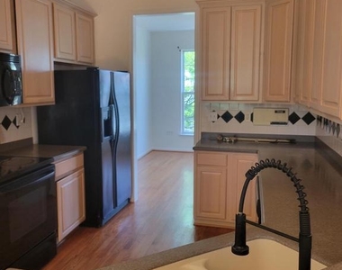 43799 Maison Blanc Square - Photo Thumbnail 4