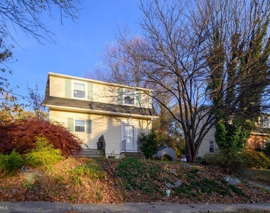 5911 Brackenridge Avenue - Photo Thumbnail 1