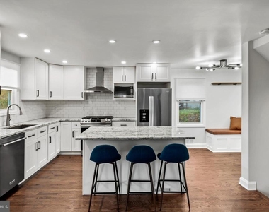 5911 Brackenridge Avenue - Photo Thumbnail 5