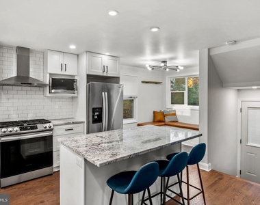 5911 Brackenridge Avenue - Photo Thumbnail 6