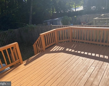 7604 Mcnamara Drive - Photo Thumbnail 4