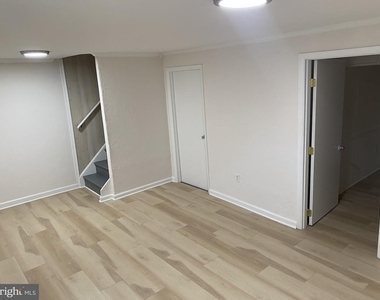 7604 Mcnamara Drive - Photo Thumbnail 1
