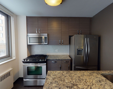 401 E 34th St - Photo Thumbnail 1