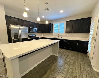 9702 Canyon Landing Avenue - Photo Thumbnail 12