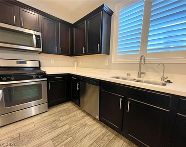 9702 Canyon Landing Avenue - Photo Thumbnail 13