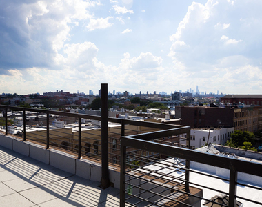 277 Irving Ave - Photo Thumbnail 1