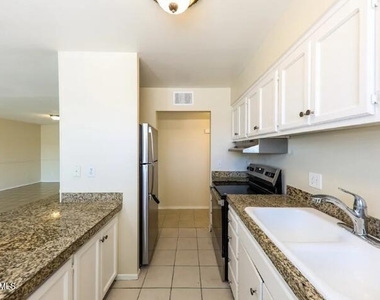 3132 W Surrey Avenue - Photo Thumbnail 3