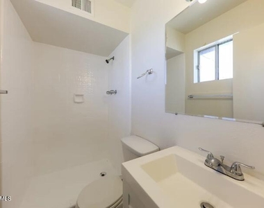 3132 W Surrey Avenue - Photo Thumbnail 5