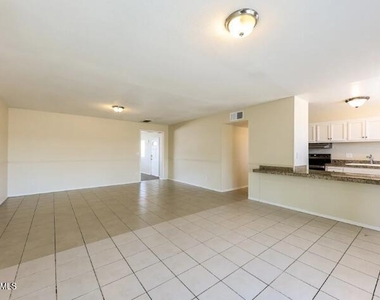 3132 W Surrey Avenue - Photo Thumbnail 2