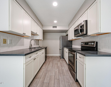 5634 S Captain Kidd Court - Photo Thumbnail 6