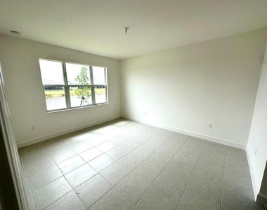 11785 Sw Oceanus Boulevard - Photo Thumbnail 2