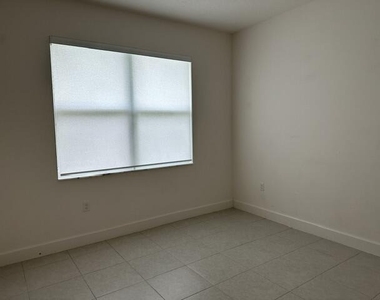 11785 Sw Oceanus Boulevard - Photo Thumbnail 20