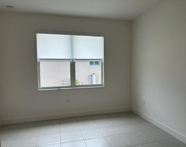 11785 Sw Oceanus Boulevard - Photo Thumbnail 21