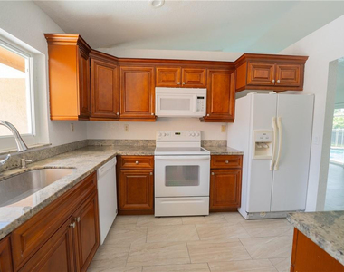 5332 Nw 29th Court - Photo Thumbnail 2