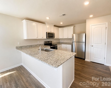 8100 Derby Woods Lane - Photo Thumbnail 4