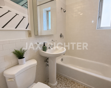 E 20th St - Photo Thumbnail 7
