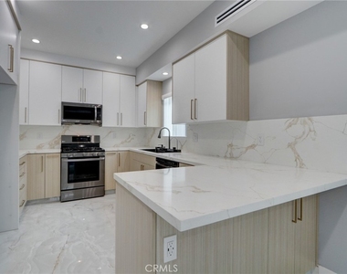 7744 Ostrom Avenue - Photo Thumbnail 4