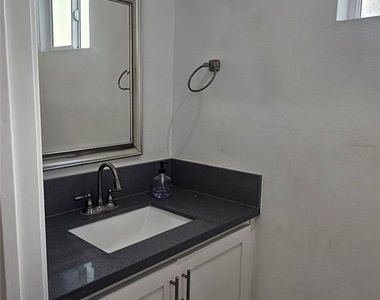1662 E 60th - Photo Thumbnail 14