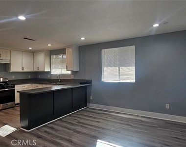 1662 E 60th - Photo Thumbnail 2