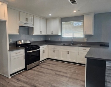 1662 E 60th - Photo Thumbnail 7