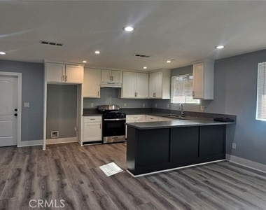 1662 E 60th - Photo Thumbnail 1